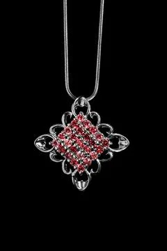 Silver necklace on black Stock Photos