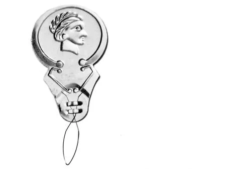 Silver Needle Threader on white background Stock Photos