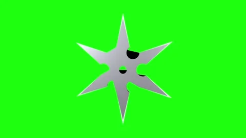 Silver ninja star spins in front of a green background Stock-Footage 287011788