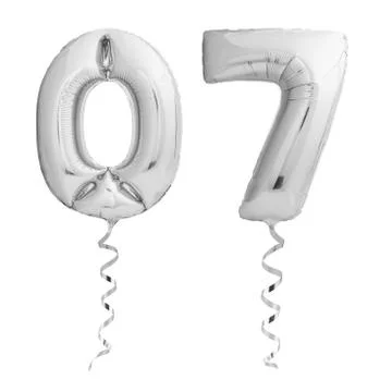 Silver number 07 made of inflatable party balloons with silver ribbons isolated Foto stock