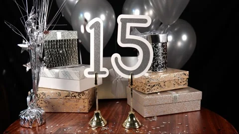 Silver Number 15 with Silver Confetti Glitter Sparkles with Gifts and Balloons Stock Footage 346644843