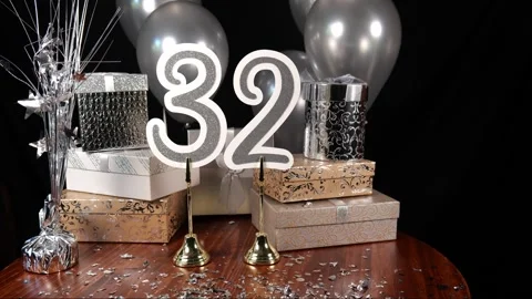 Silver Number 32 with Silver Confetti Glitter Sparkles with Gifts and Balloons Stock Footage 346644994