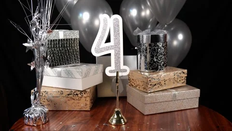 Silver Number 4 with Silver Glitter Confetti Sparkles with Gifts and Balloons Stock Footage 346644702