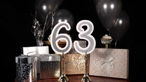 Silver Number 63 with Silver Glitter Sparkles with Gifts and Balloons and Stock Footage 342592438