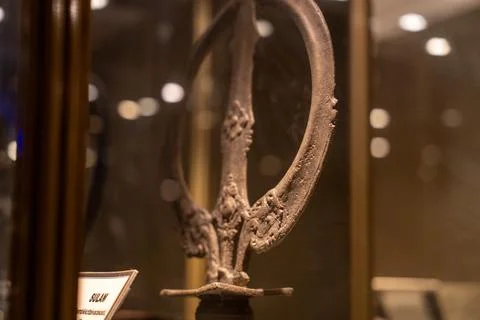 A silver object with a design on it. in Chennai Stock-Fotos