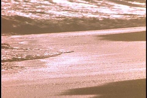 Silver ocean waves and overseer leading chained men Stock Footage 86751427
