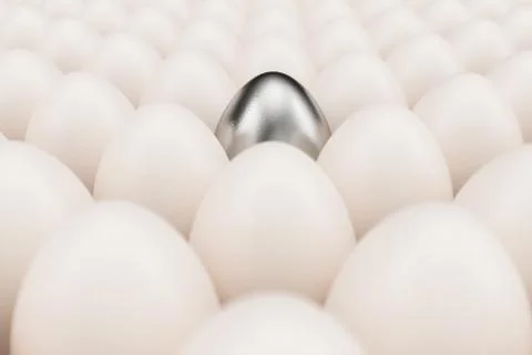 Silver or white gold egg in a centre. Background of white chicken eggs with one Stock Illustration