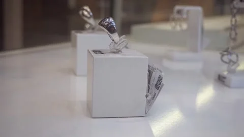 Silver or white gold ring standing on a podium Stock Footage 303993516