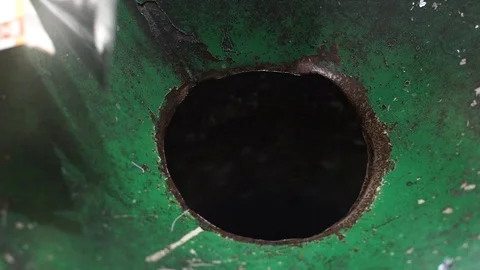 Silver package crushing in machine Video stock 103991536