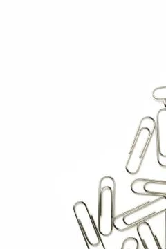 Silver paper clips Stock Photos