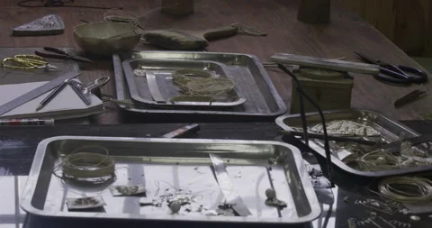 Silver parts on table with reflection Stock Footage 141364429