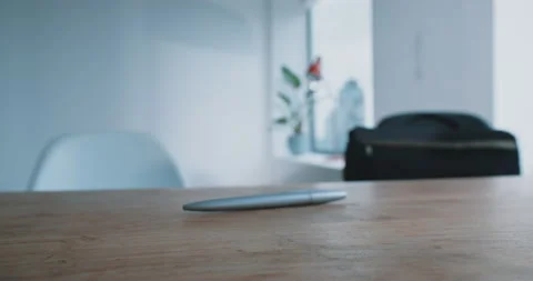 Silver pen on a desk office Stock Footage 208046917