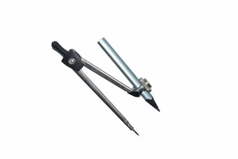 A silver pencil compass attached to a silver colored wood pencil crayon Stock Photos