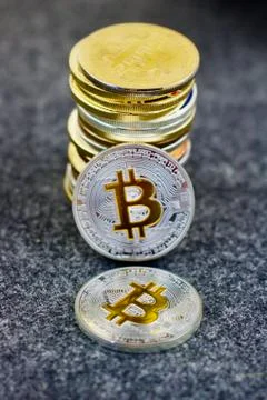 Silver physical bitcoin coins Stock Photos