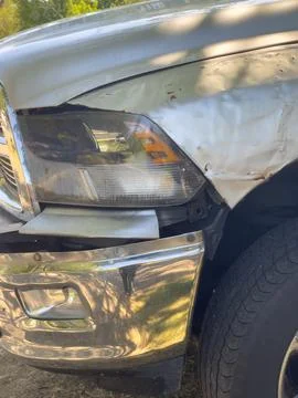 A silver pickup with damage Stock Photos