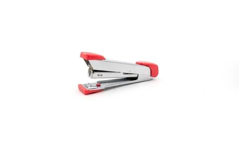 Silver pink stapler isolated on white background Stock Photos