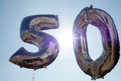 Silver plastic  balloons for a 50th Stock Photos