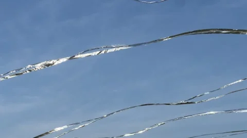 Silver plastic flag blowing Stock Footage 306128241