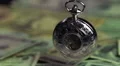 Silver pocket watch and dollars, time is running out like money. Time management HD Footage
