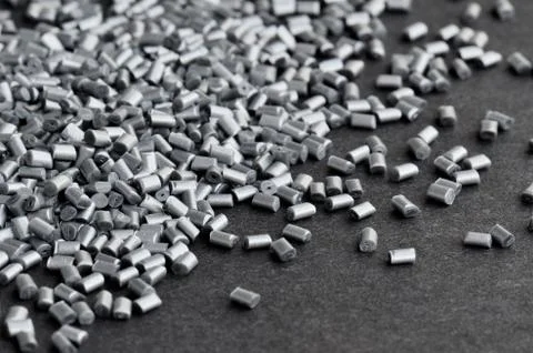 Silver polymer on grey Stock Photos