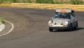 Silver Porsche 911 with lots of luggage and spare wheels on roof speed drive HD Footage