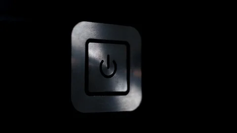 Silver power button on black background. Stock Footage 102656944
