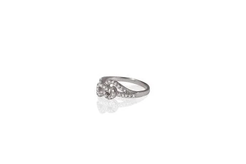 Silver precious treble clef ring female with diamonds on white isolated backg Stock Photos