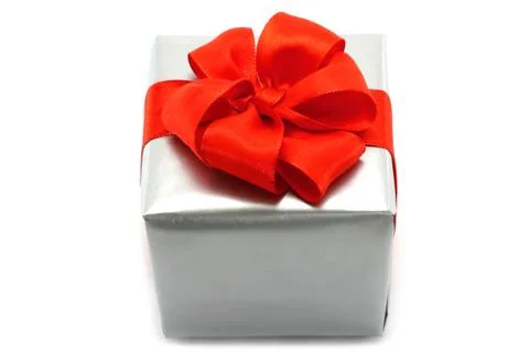 Silver present box with red bow Stock Photos