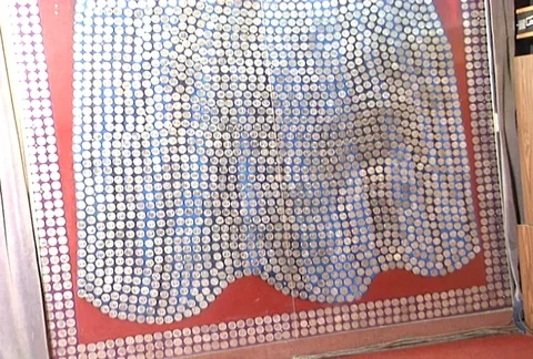 Silver Queen made of silver dollars tilt up Stock Footage 98053042