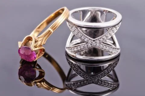 Silver ring and a thin gold ring with ruby 스톡 사진