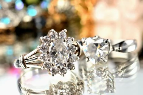 Silver ring with artificial stone and another ring in background - jewelery Stock Photos