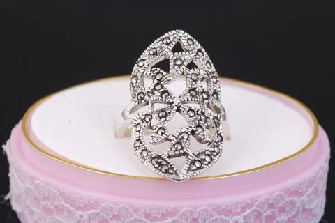 Silver ring on black background Stock Photos