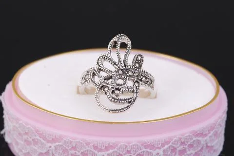 Silver ring on black background Stock Photos