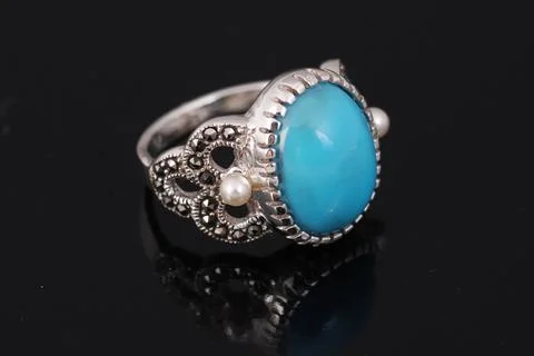 Silver ring on black background Stock Photos