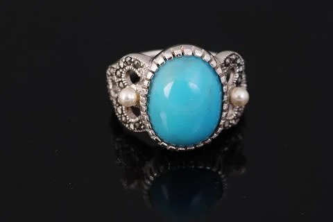 Silver ring on black background Stock Photos