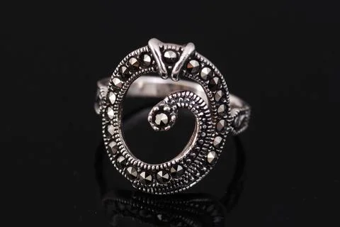 Silver ring on black background Stock Photos
