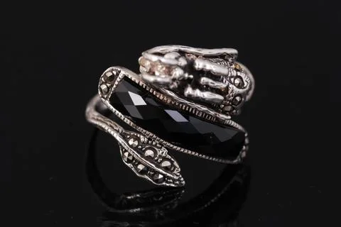 Silver ring on black background Stock Photos