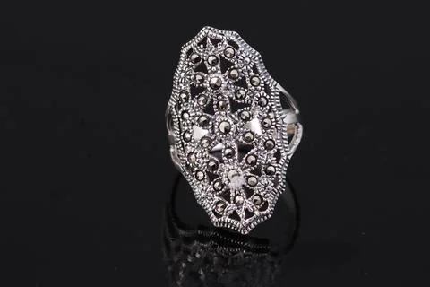 Silver ring on black background Stock Photos