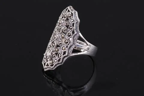 Silver ring on black background Stock Photos