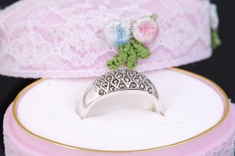 Silver ring on black background Stock Photos