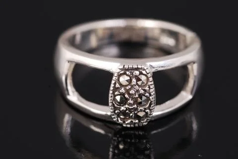 Silver ring on black background Stock Photos