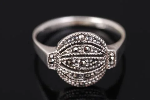 Silver ring on black background Stock Photos