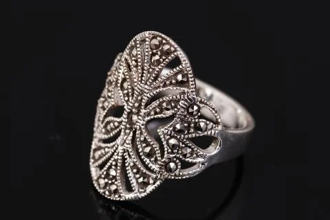 Silver ring on black background Stock Photos