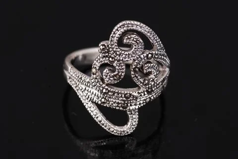 Silver ring on black background Stock Photos