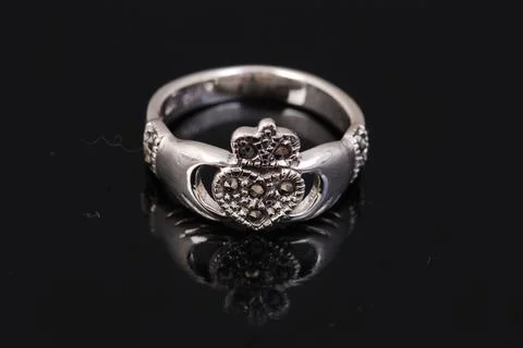 Silver ring on black background Stock Photos