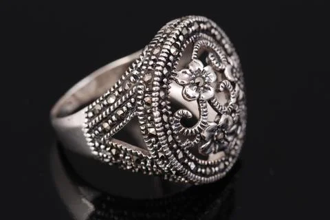 Silver ring on black background Stock Photos