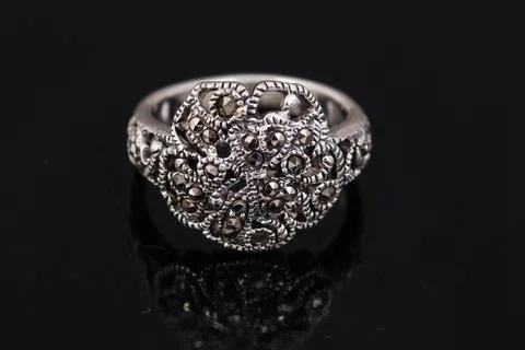 Silver ring on black background Stock Photos