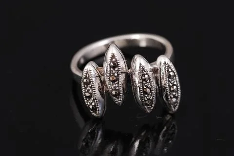 Silver ring on black background Stock Photos