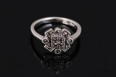 Silver ring on black background Stock Photos