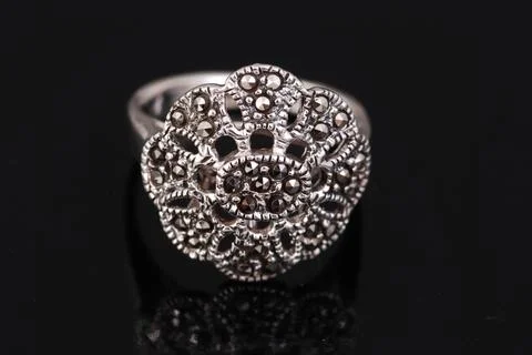 Silver ring on black background Stock Photos
